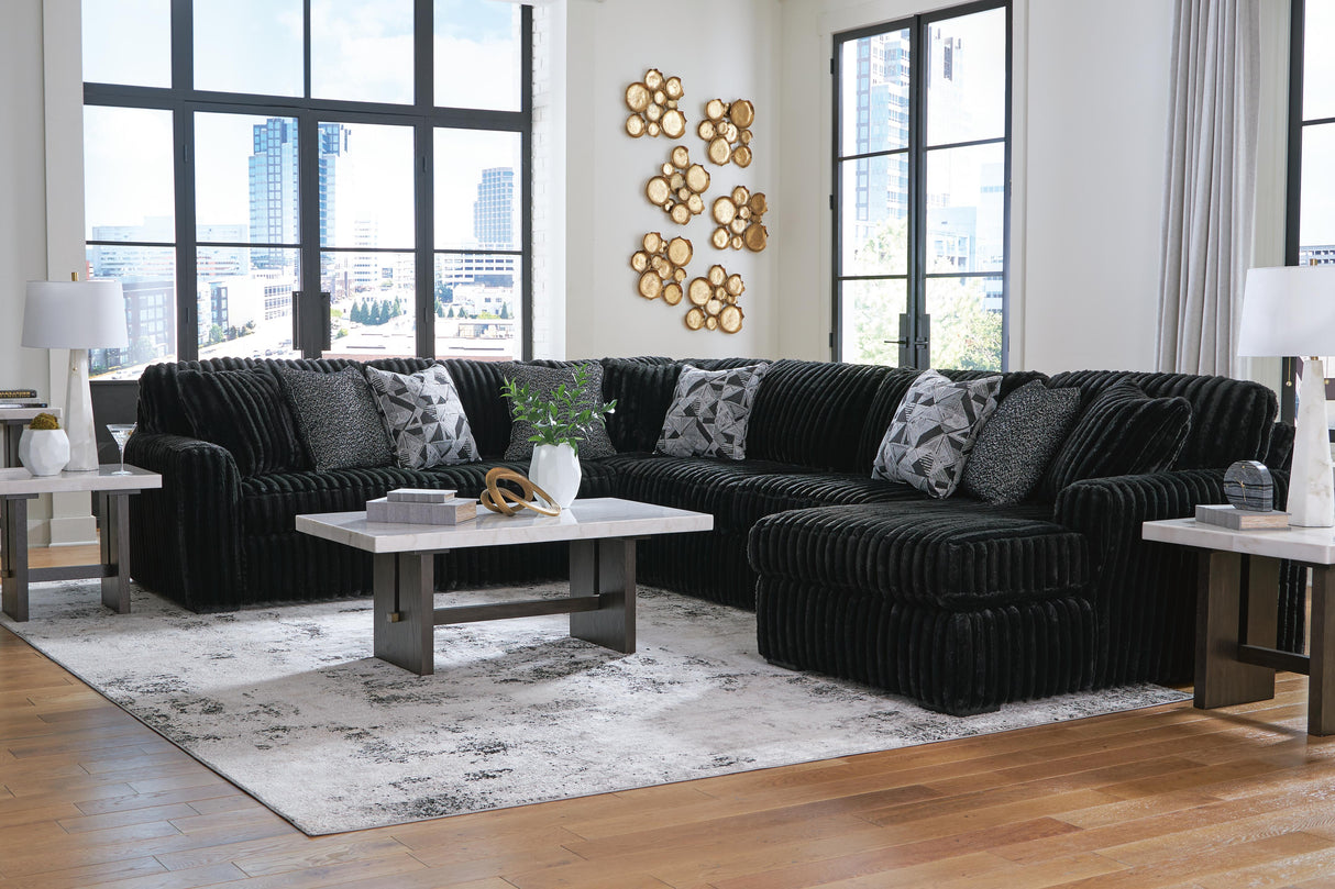 Midnight-Madness 4-Piece Sectional with Chaise - 98103S3