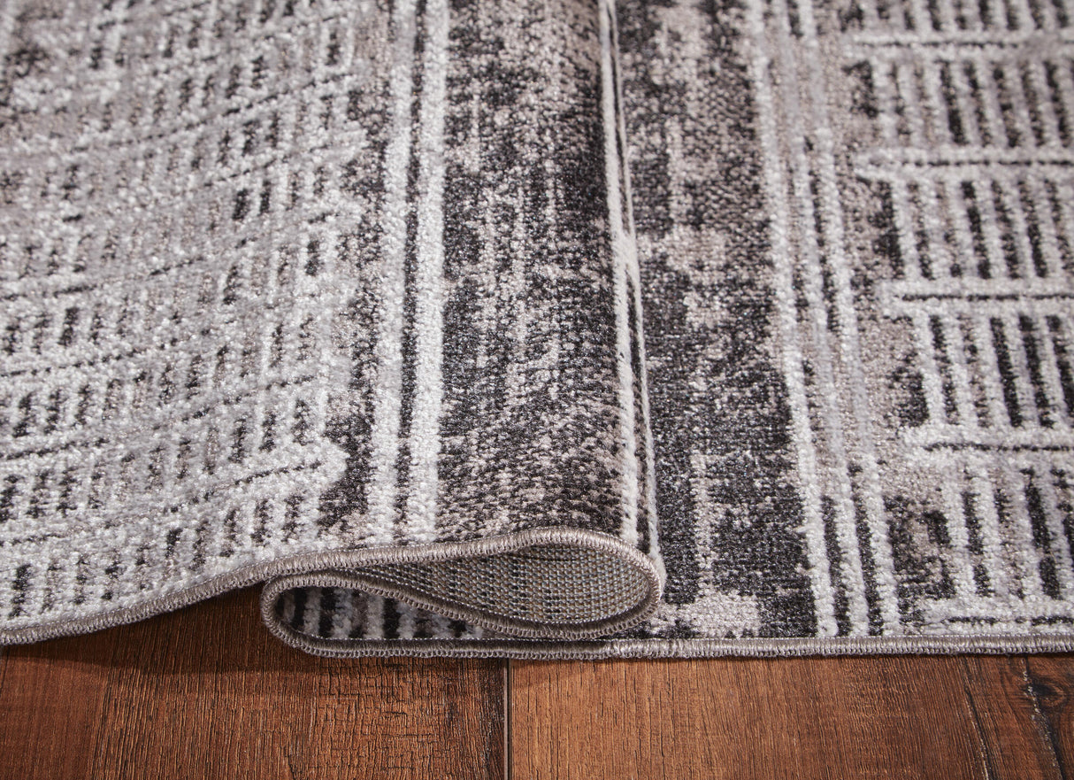 Henchester 5' x 7' Washable Rug - R405992