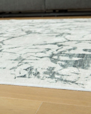 Tobinbury Washable 5' x 7' Area Rug - R407422