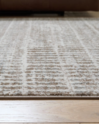 Fuadwick 5'3" x 7' Area Rug - R407692