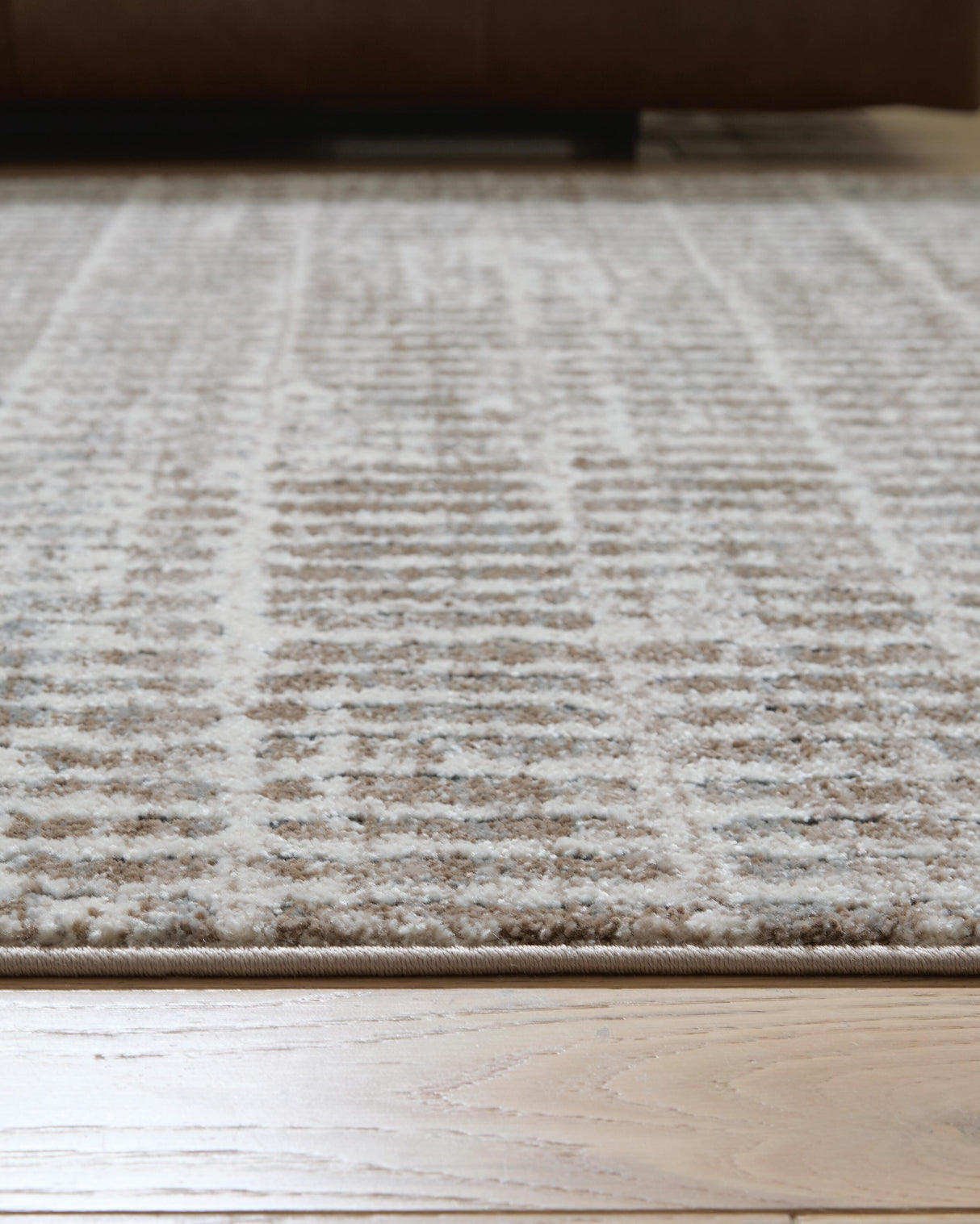 Fuadwick 5'3" x 7' Area Rug - R407692