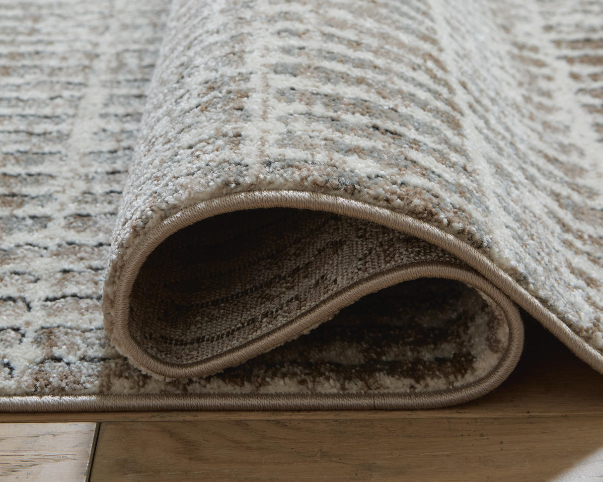 Fuadwick 7'10" x 10' Area Rug - R407691