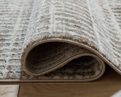Fuadwick 5'3" x 7' Area Rug - R407692
