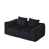 Minimalist Sofa With Curved Lines And Horn Shaped Throw Pillows