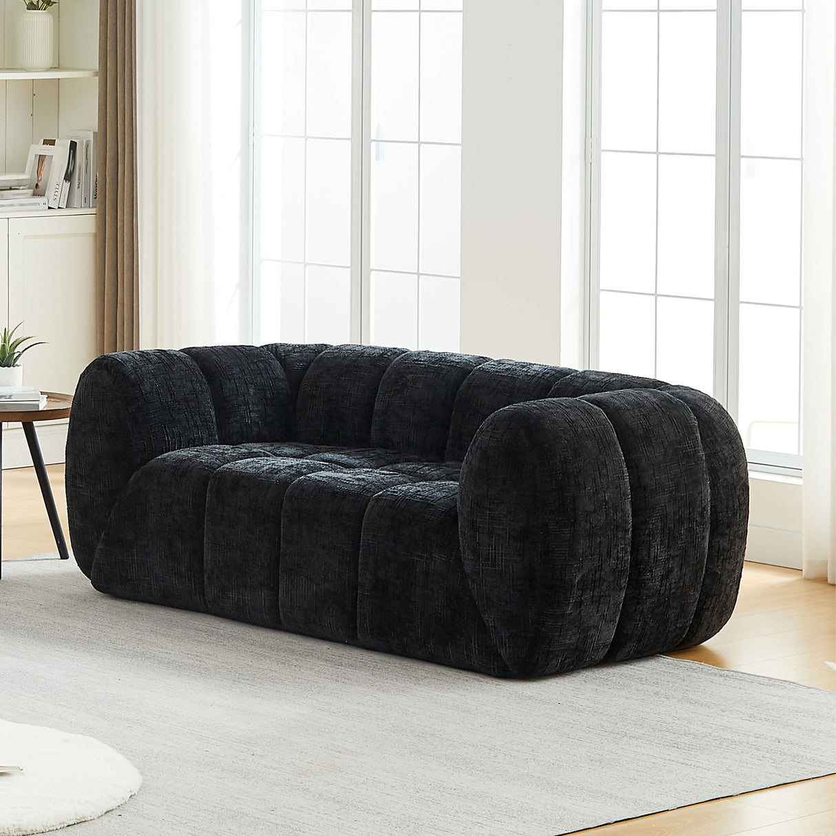 Quilted Cloud Sofa With Rounded Armrests And Piano Key Backrest Design
