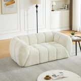 Quilted Cloud Sofa With Rounded Armrests And Piano Key Backrest Design