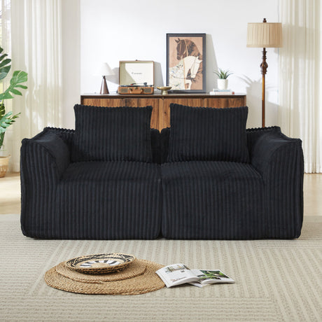 Minimalist Sofa With Curved Lines And Horn Shaped Throw Pillows