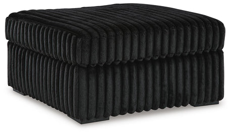 Midnight-Madness 2-Piece Sectional and Oversized Accent Ottoman - 98103U4