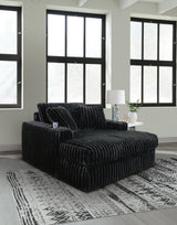Midnight-Madness 4-Piece Sectional and Oversized Chaise - 98103U2