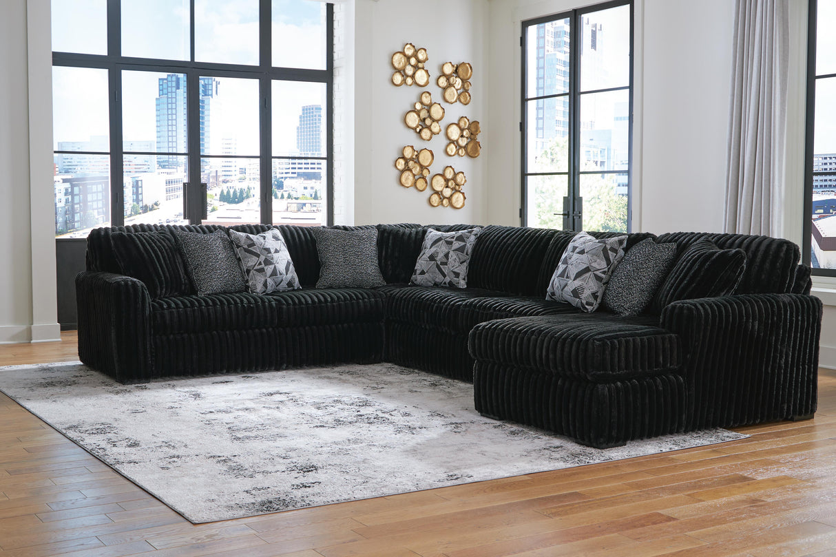 Midnight-Madness 4-Piece Sectional with Chaise - 98103S3