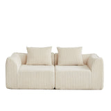 Minimalist Sofa With Curved Lines And Horn Shaped Throw Pillows