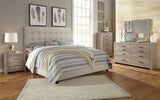 Dolante Queen Upholstered Bed - B130-581