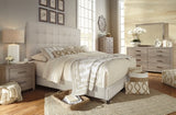 Dolante Queen Upholstered Bed - B130-581