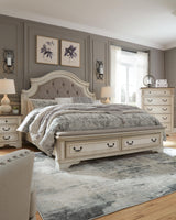 Realyn California King Upholstered Storage Bed - B743B21