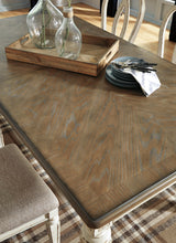 Realyn Dining Extension Table and 8 Chairs - D743D19