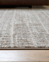 Fuadwick 5'3" x 7' Area Rug - R407692