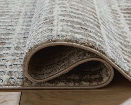 Fuadwick 7'10" x 10' Area Rug - R407691