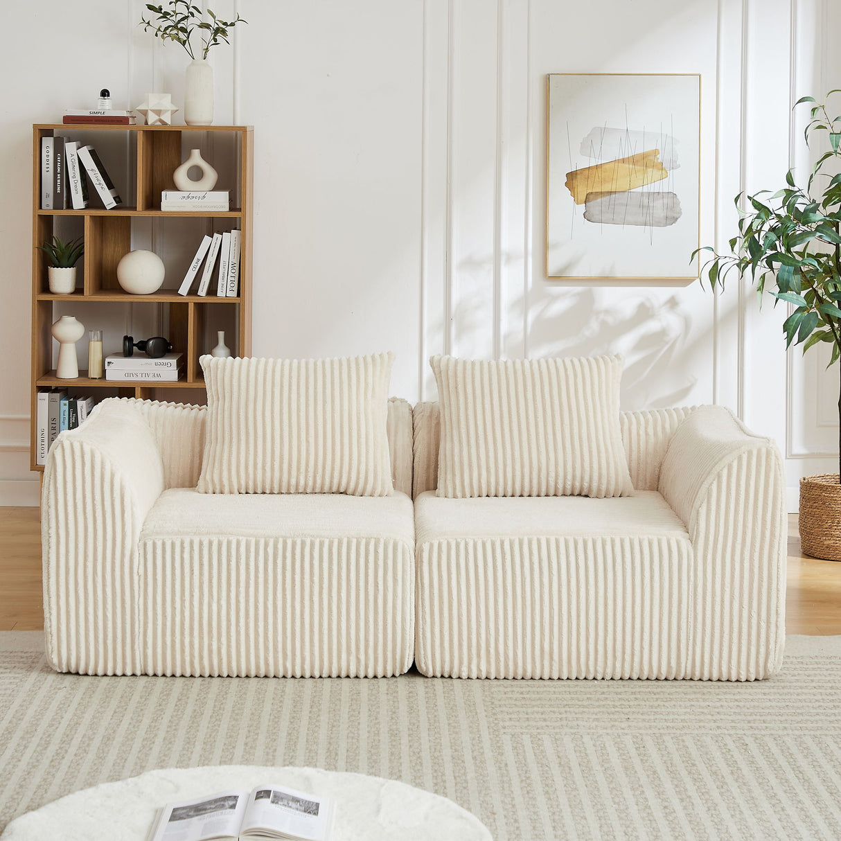 Minimalist Sofa With Curved Lines And Horn Shaped Throw Pillows